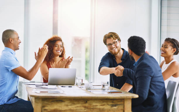 istock Everyone couldn't be happier about the merger 1142812674