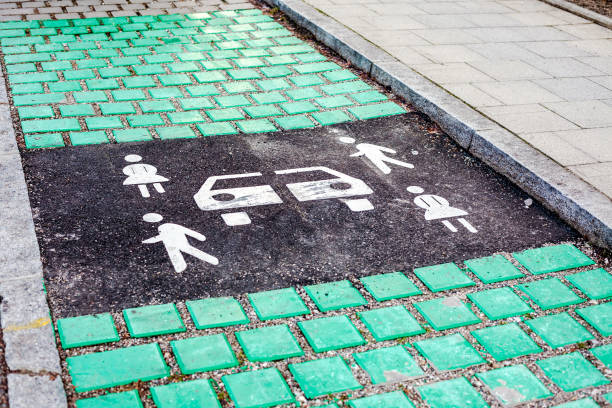 istock Car sharing vehicle parking sign on asphalt road 1142813526