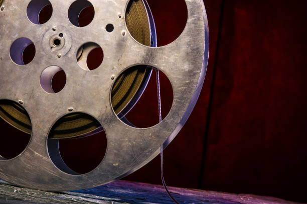 istock 35 mm film reel with dramatic lighting on a dark background 1142815128