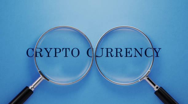 istock Crypto Currency Concept - Magnifiers And Crypto Currency  Text On Blue Background 1142818243