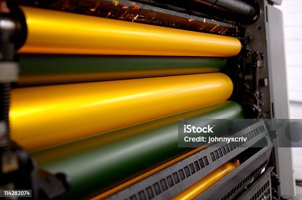 Yellow Rollers Stock Photo - Download Image Now - Conveyor Belt, Machinery, Printing Out