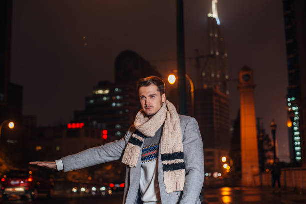 istock Gentleman catching a ride in city 1142822779
