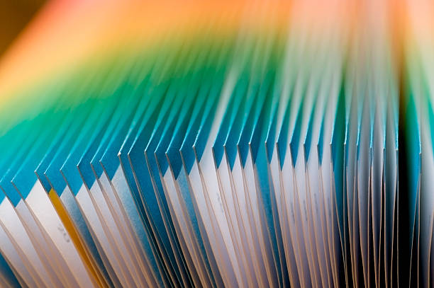 doblado francés de hermosos colores de las páginas. - stack paper document paperwork fotografías e imágenes de stock