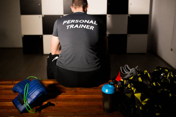 istock Personal trainer in a locker room is getting ready to start his job 1142823644