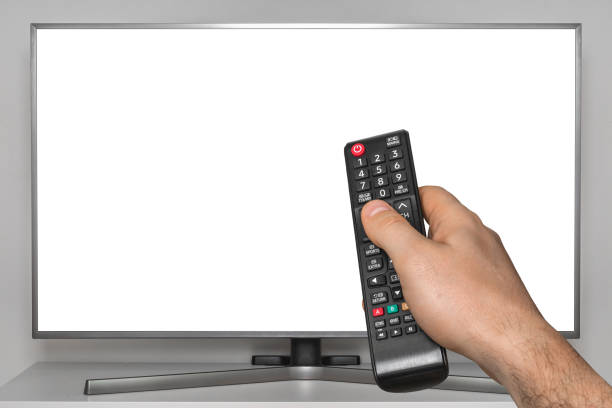 istock White screen on TV and human hand with TV remote control 1142824932