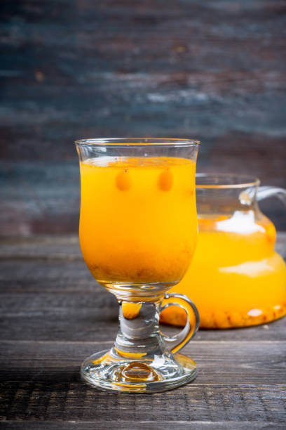 istock Hot buckthorn beverage in glass 1142825286