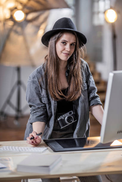 istock Portrait of a Photographer Working in The Studio 1142832189