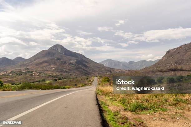 Br 222 National Highway Crossing At Sertao Ceara State Serra De Uruburetama Mountains Far On The Background Stock Photo - Download Image Now