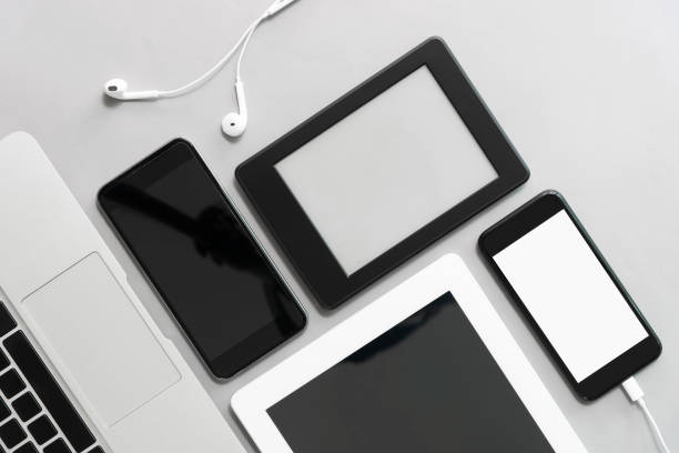 istock Modern technology devices on table in office. Mockup many size of mobile, tablet with empty screen for add texts. 1142832539