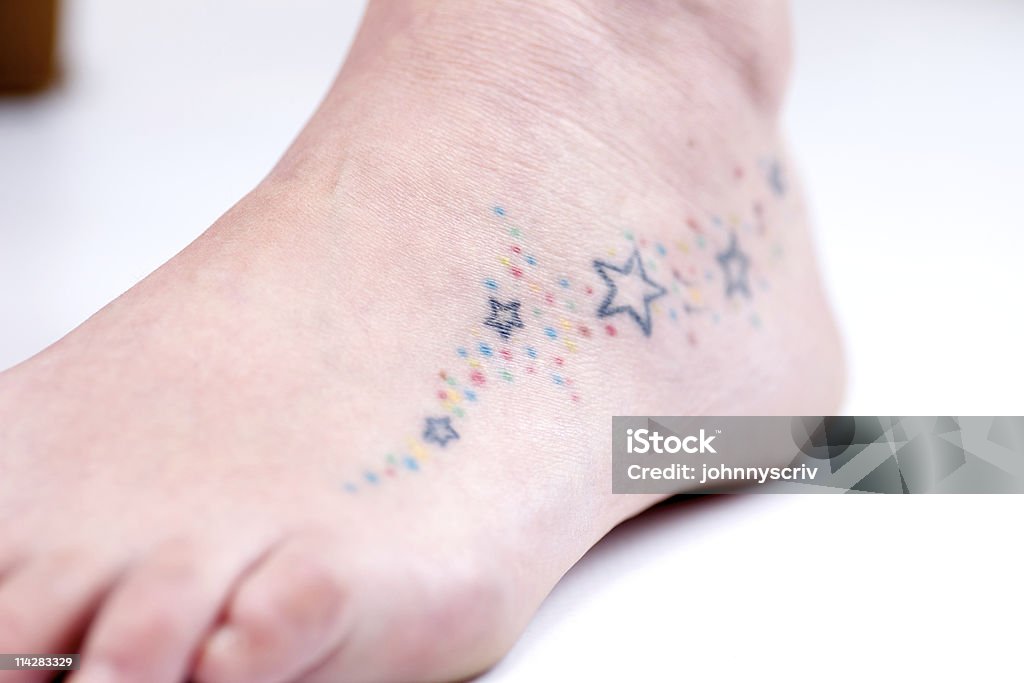 Tattooed Foot...  Star Shape Stock Photo