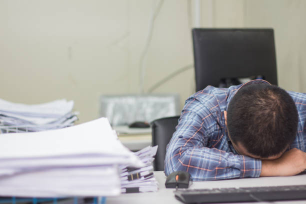 istock A man working hard burn out syndrome 1142834740