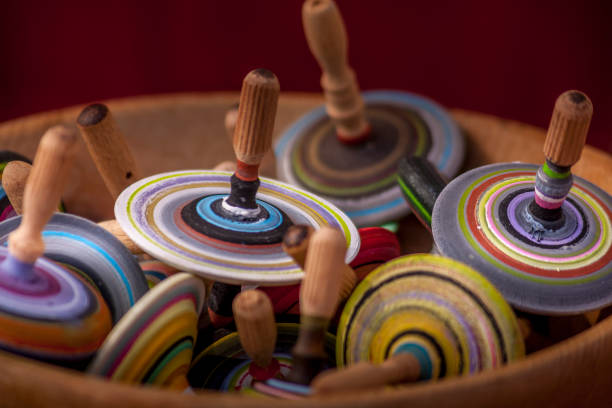 istock Wooden handrcrafted spinning top 1142835343