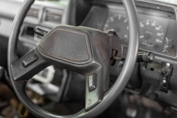 istock Steering wheel and console in old pickup 1142836805