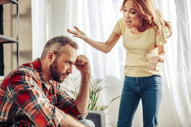 istock Conflict between husband and wife in their house 1142838281