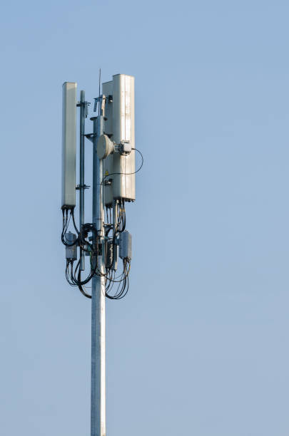 istock Telecommunication tower antenna on blue sky background. 1142838616
