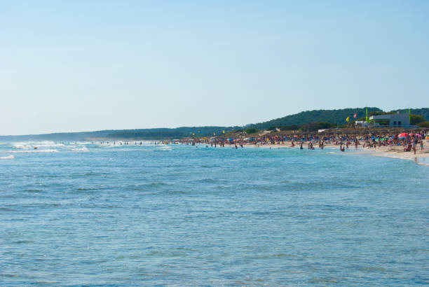 istock Crowded sand beach of Minorca island 1142841374