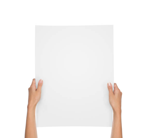 istock Hands holding blank paper sheet isolated on white 1142841672