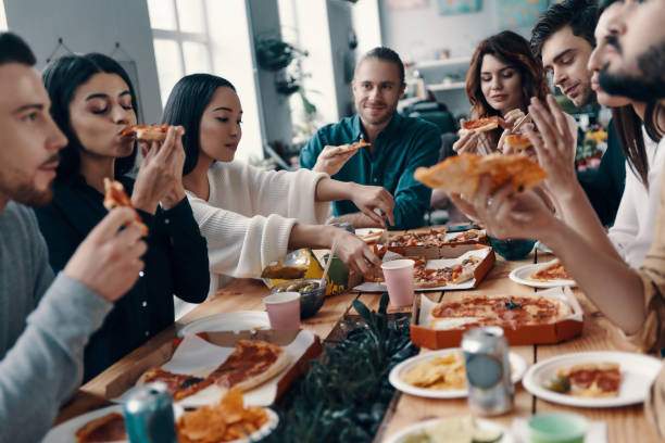 6,418 Large Group Of People Eating Stock Photos, Pictures & Royalty-Free  Images - iStock | Big meal