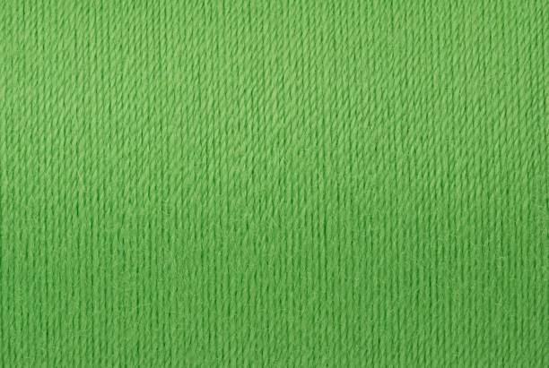 imagen macro de fondo de textura de rosca verde - twisted yarn fotografías e imágenes de stock