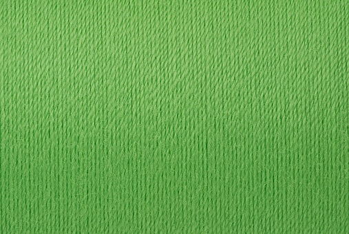 Macro picture of green thread texture surface background