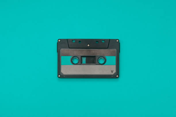 istock audio cassettes tape lay on vibrant blue background 1142844581