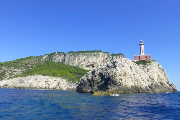 istock Faro di Punta Carena lighthouse on Capri, Italy 1142844847