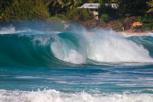 Beautiful and spectacular waves crashing at Tunnels Beach (Makua Beach) on the Hawaiian island of Kauai, USA