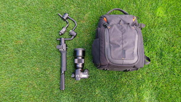 istock Camera and video production equipment on grass 1142846243