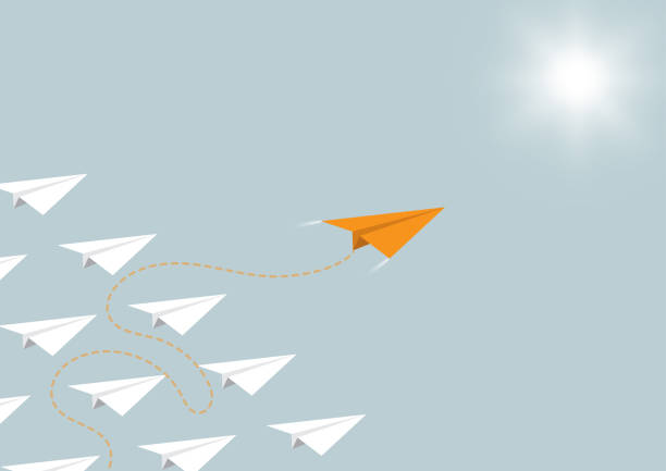 istock Paper airplane competition with orange airplane ahead, business competition leadership ambitious successful goal concept vector illustration 1142846585