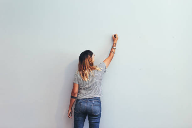 istock Artist making a sketch on a wall 1142851519