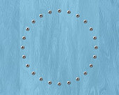 Background in the form of a circle of screws