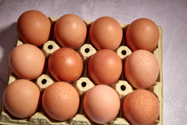 istock orange eggs of farm chicken 1142856371