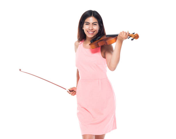 istock Beautiful young latina playing the violin 1142858643