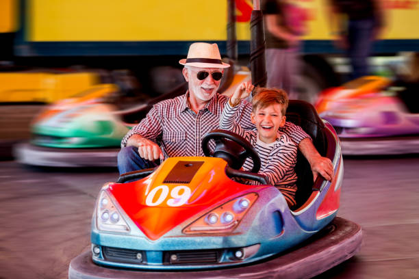 istock Family in bumper car 1142858897