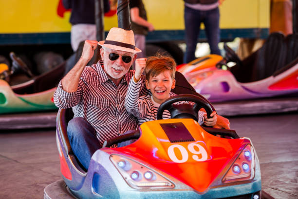 istock Family in bumper car 1142859002