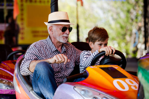istock Family in bumper car 1142859039