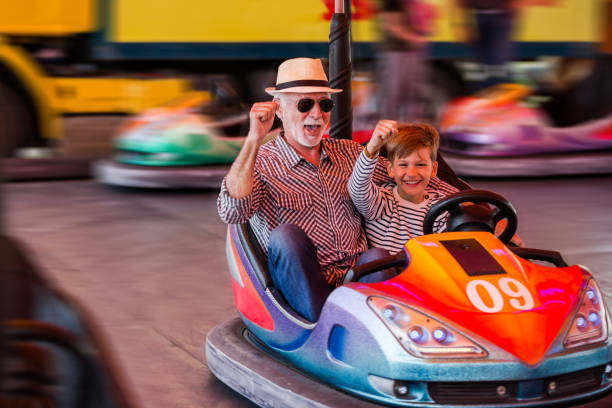 istock Family in bumper car 1142859919