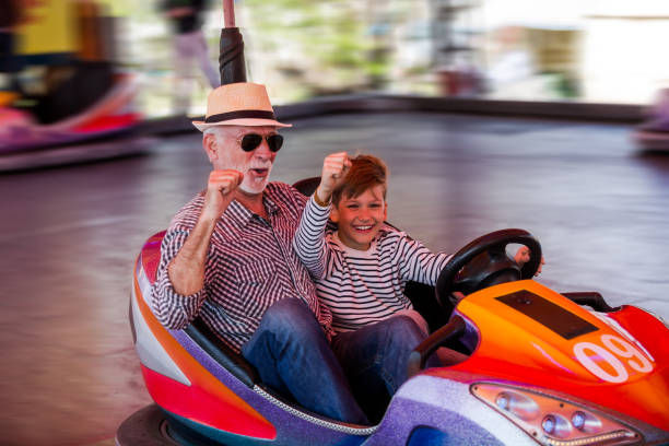 istock Family in bumper car 1142860035