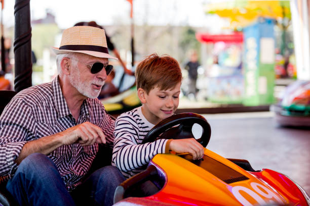 istock Family in bumper car 1142860588