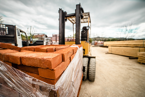 a stack of bricks at a construction site of a new home