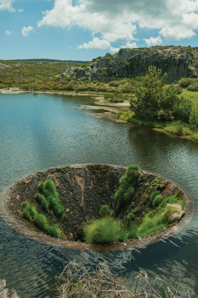 istock Large sinkhole in a dam lake on the highlands 1142860765