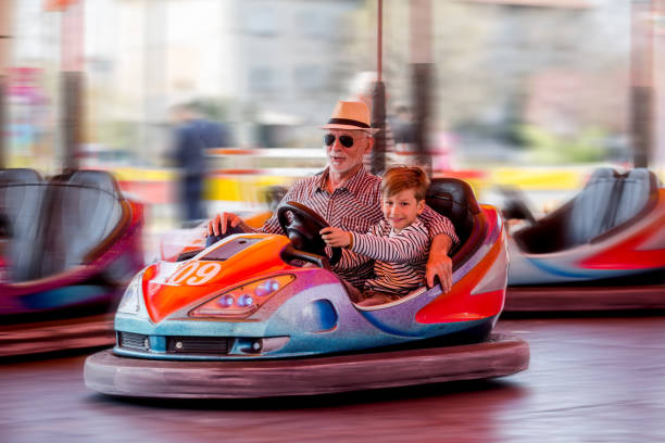 istock Family in bumper car 1142861044