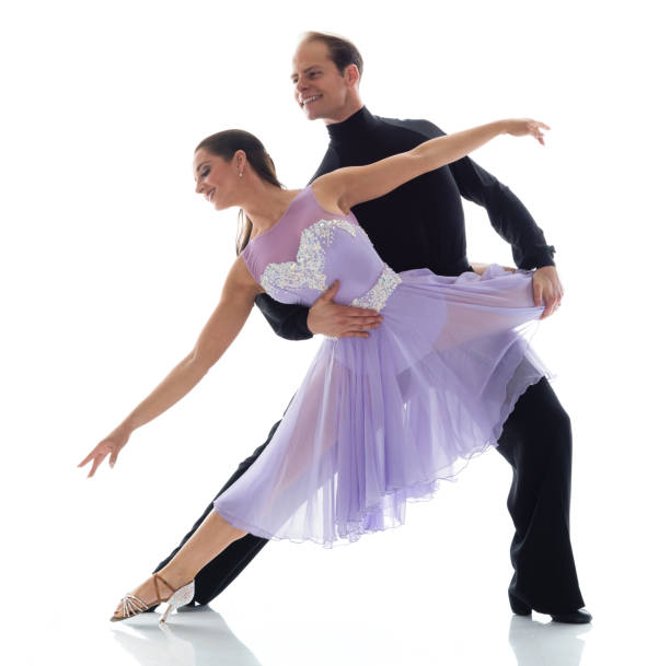istock Two beautiful ballroom dancers 1142863376