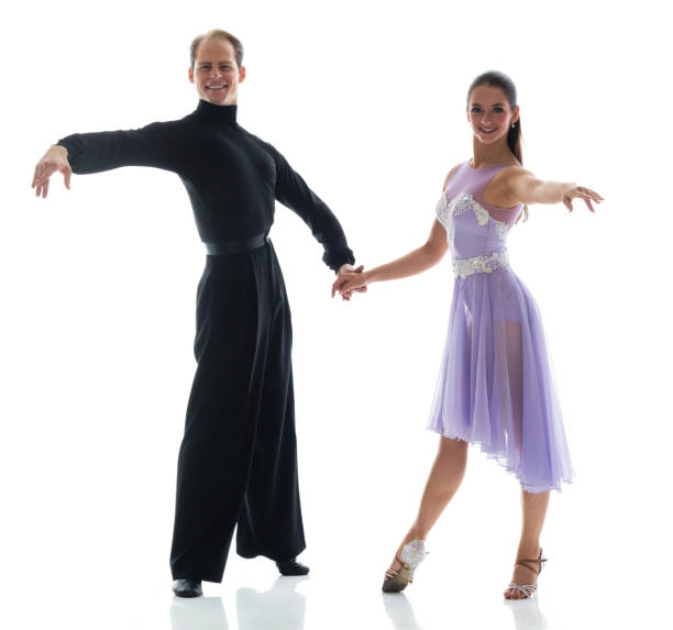 istock Two beautiful ballroom dancers 1142863434