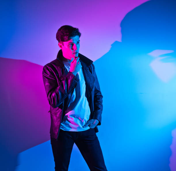 istock Handsome young man in colorful environment 1142865250