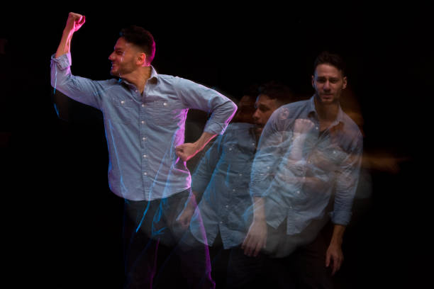 istock Handsome man in a blue shirt dancing 1142865500