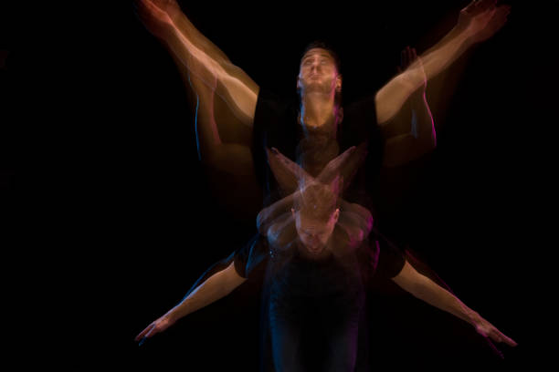 istock Good looking man in a black shirt dancing 1142866326