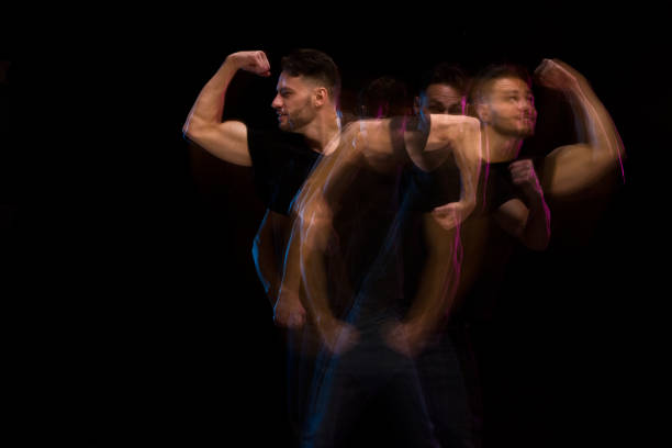 istock Good looking man in a black shirt dancing 1142866348
