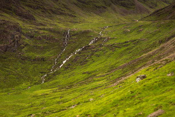Typical landscape on the Gaelic peninsula Applecross Typical landscape with pastures on the Gaelic peninsula Applecross, Strathcarron, Inner Hebrides, Scotland, UK applecross peninsula stock pictures, royalty-free photos & images