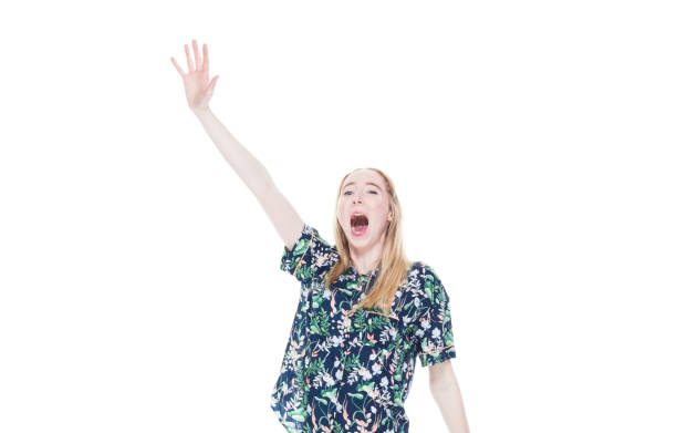 istock Attractive white female in pajamas - shouting 1142866755